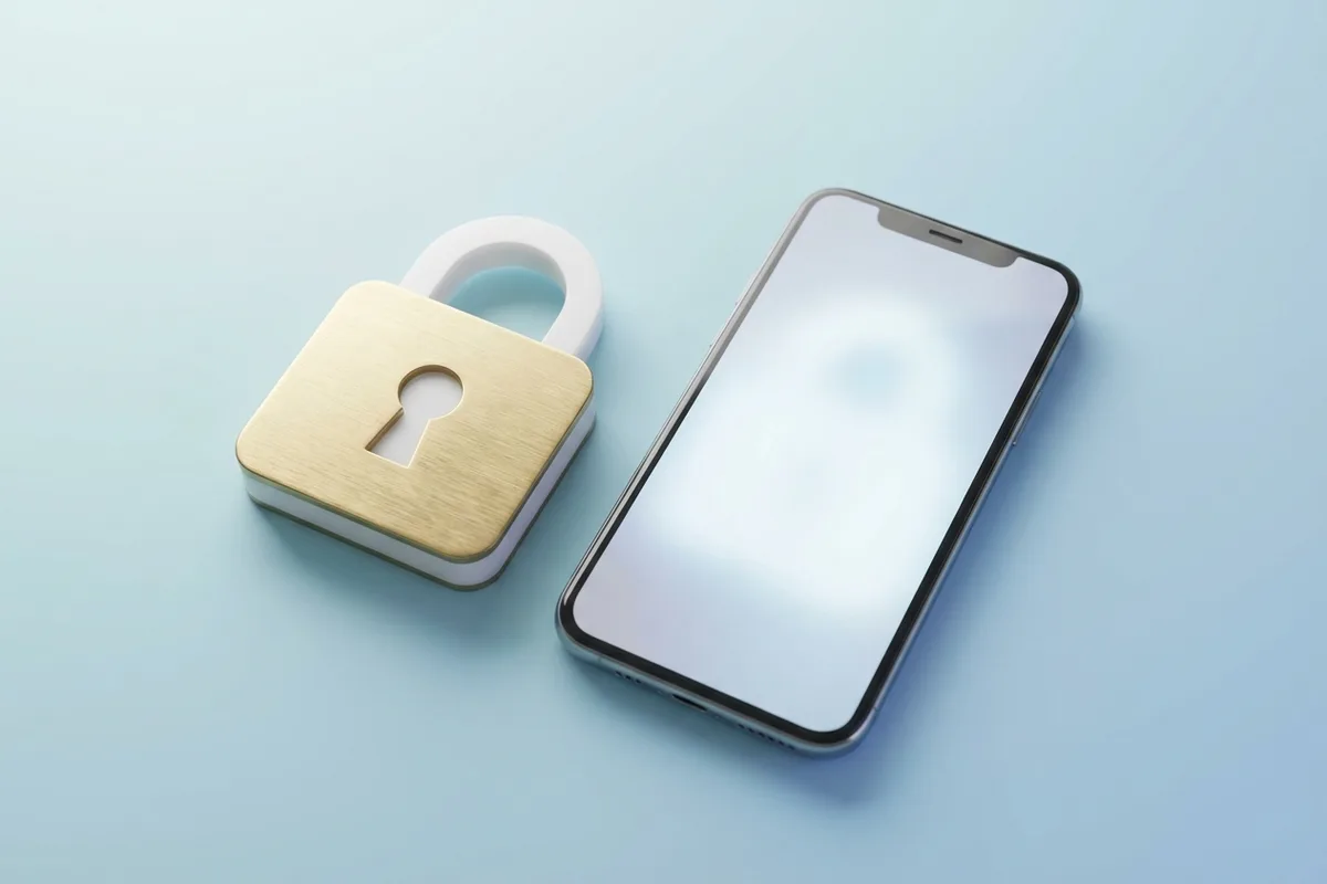 Padlock illustration next to a smartphone on a pastel blue background